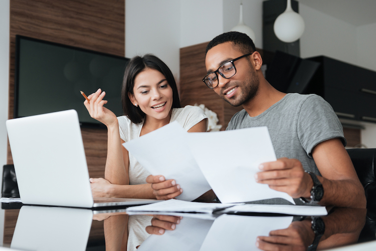 couple analyzing documents