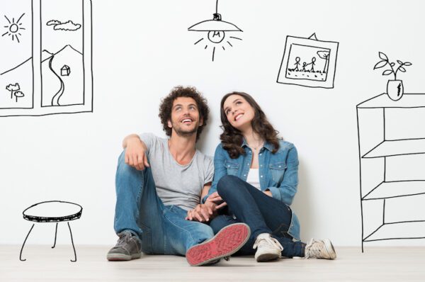 portrait young couple sitting on floor