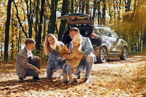 a happy family just moved house in the fall