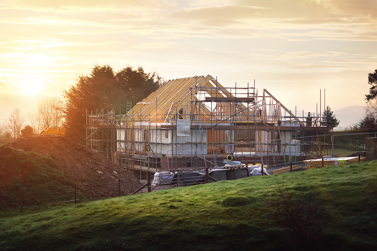 home under construction on building site
