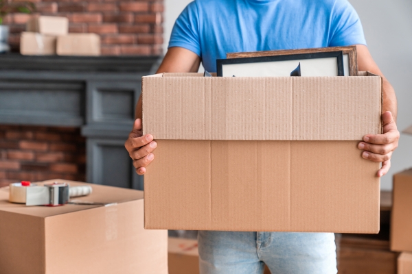 man holding large box