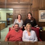 4 people posing for a photo