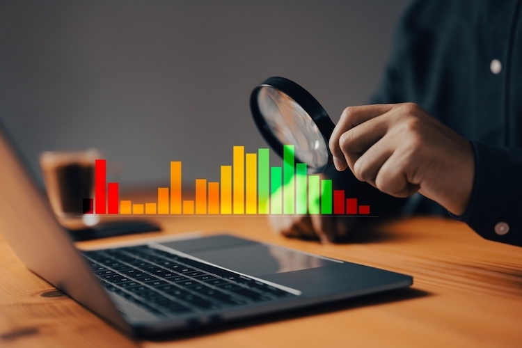 credit score graph illustration in front of laptop