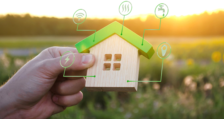 miniature house with utility symbols