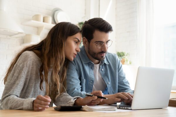 couple working from a laptop