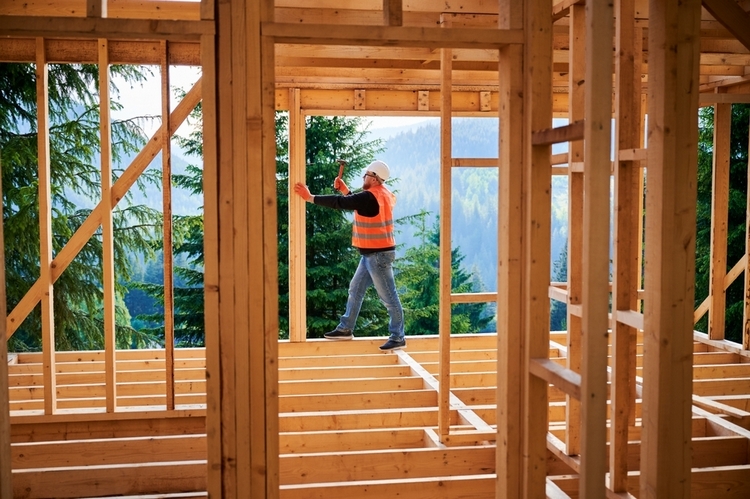 carpenter-home-constructing-two-story-wooden-frame-house