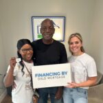 3 people with a financing by DSLD mortgage sign