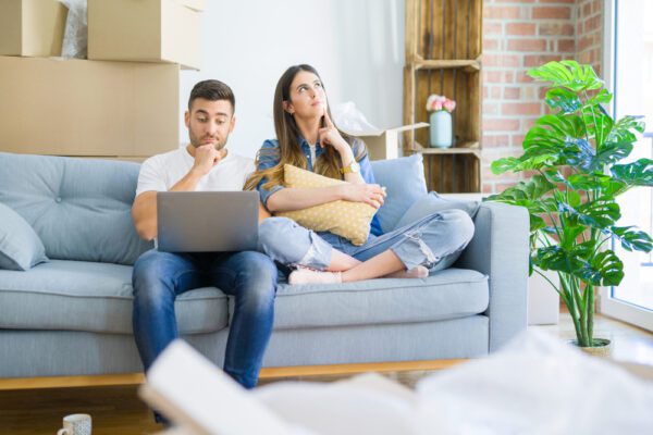 A couple sat on the sofa