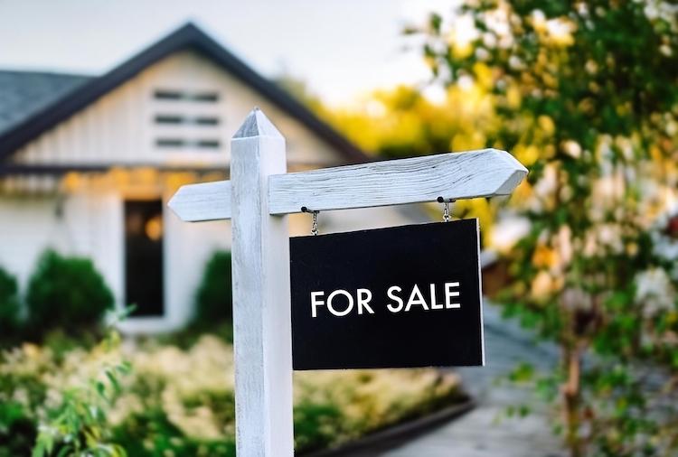 for sale sign front house