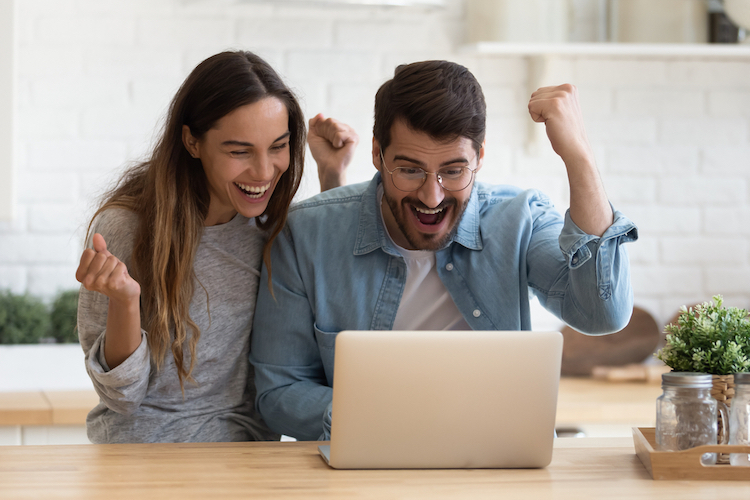 young couple celebrating