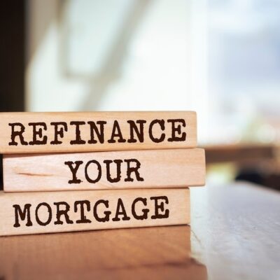wooden blocks words refinance your mortgage